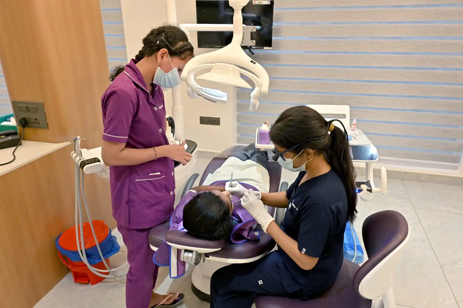 Dental team treating patient